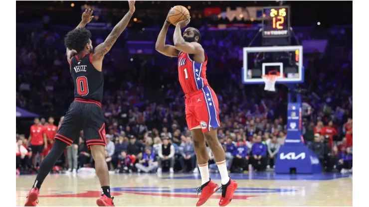 James Harden #1 of the Philadelphia 76ers shoots over Coby White #0 of the Chicago Bulls
