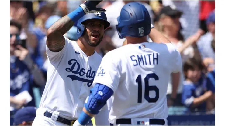 David Peralta #6 of the Los Angeles Dodgers celebrates the solo homerun of Will Smith #16
