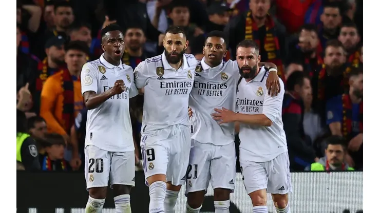 (L-R)Vinicius Junior of Real Madrid celebrates with teammates Karim Benzema, Rodrygo and Daniel Carvajal
