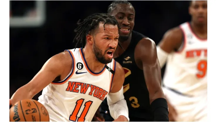 Jalen Brunson #11 of the New York Knicks drives to the basket as Caris LeVert #3 of the Cleveland Cavaliers defends
