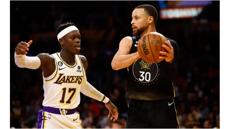 Stephen Curry #30 of the Golden State Warriors controls the ball against Dennis Schroder #17 of the Los Angeles Lakers
