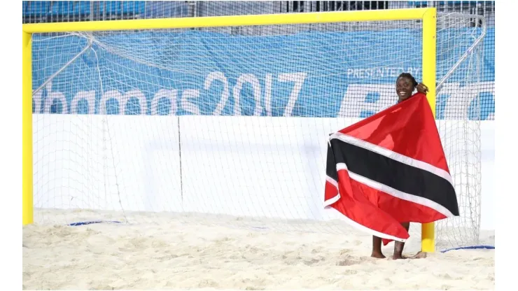 Young trinidadian with the flag of Trinidad and Tobago
