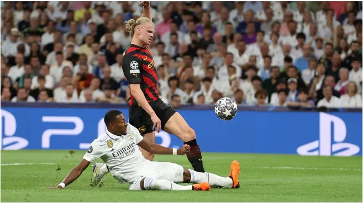 Erling Haaland of Manchester City shot is stopped by David Alaba of Real Madrid
