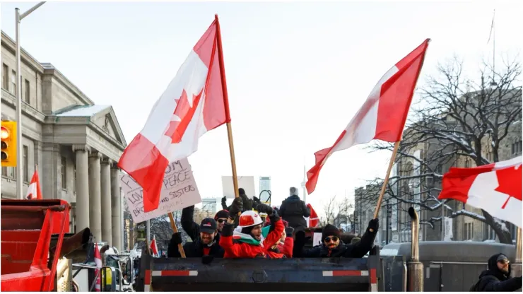 Canada fans wave flags
