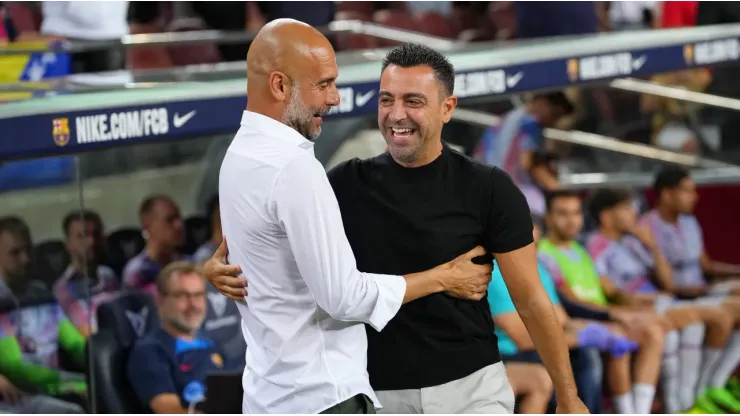 Pep Guardiola (left) and Xavi Hernandez.
