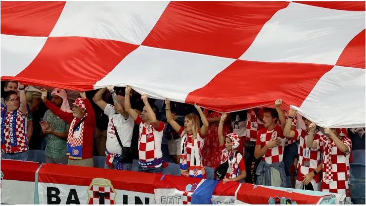 Croatia fans hold a giant Croatia flag
