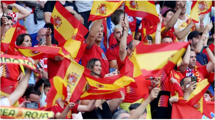 Spain fans wave flags
