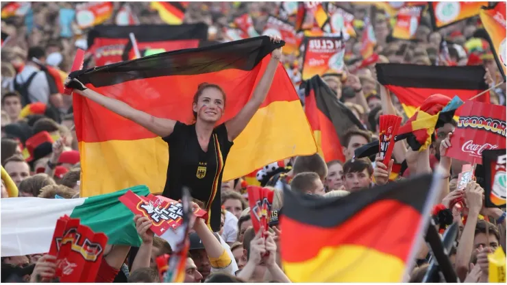 Fans wave German flags
