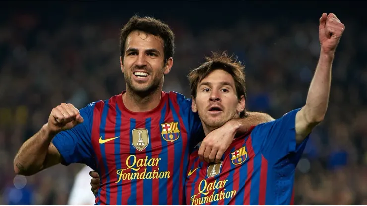 Lionel Messi with Cesc Fabregas playing for Barcelona
