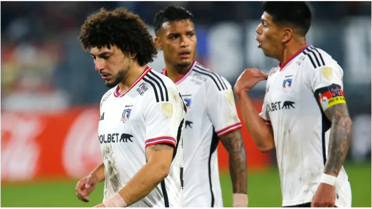 Players of Colo Colo leave the field
