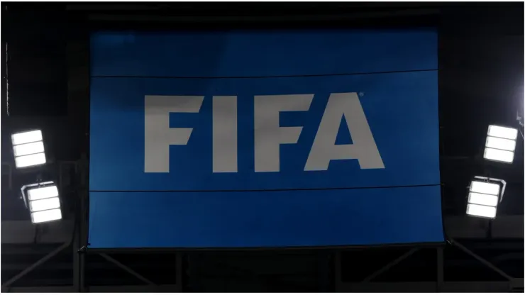 View of the FIFA logo on a flag
