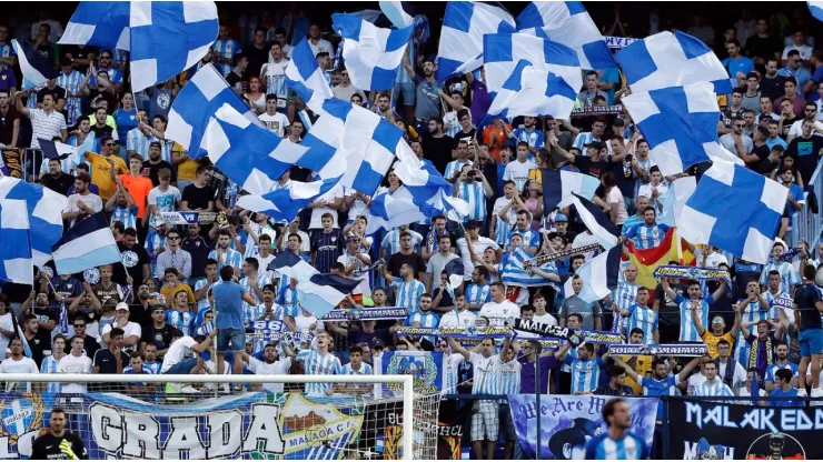 Málaga fans greet stranger at airport after club fails to make a single summer signing