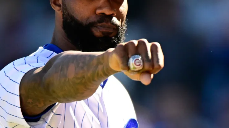 Jason Heyward #22 of the Chicago Cubs shows his world series ring 
