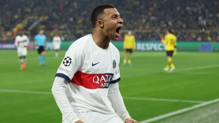 Kylian Mbappe of Paris Saint-Germain celebrates scoring a goal which was later ruled out for offside following a VAR review during the UEFA Champions League match between Borussia Dortmund and Paris Saint-Germain at Signal Iduna Park on December 13, 2023 in Dortmund, Germany.
