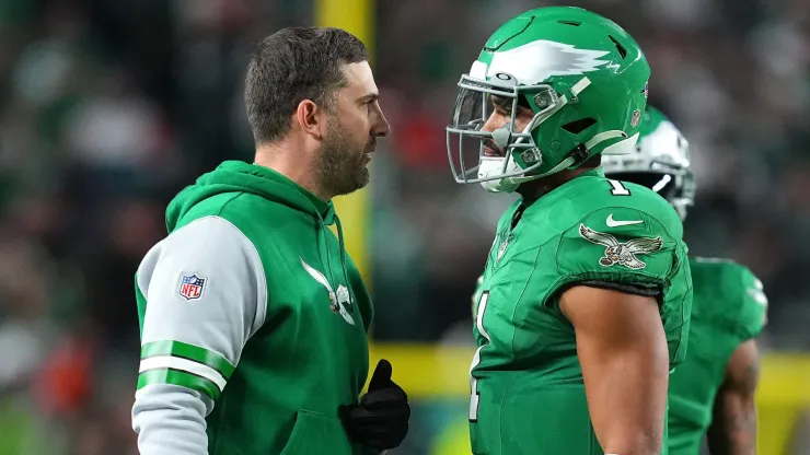 Head coach Nick Sirianni talks with Jalen Hurts #1 of the Philadelphia Eagles during the second half of a game against the Miami Dolphins at Lincoln Financial Field on October 22, 2023 in Philadelphia, Pennsylvania.
