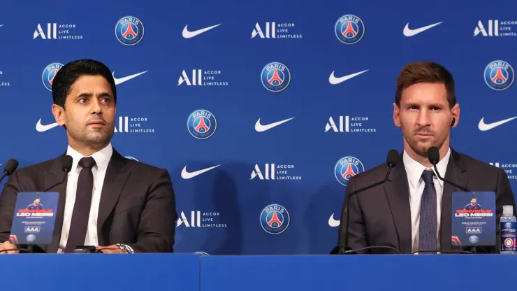 Lionel Messi answers journalists with President Nasser Al Khelaifi during a conference of Paris Saint-Germain at Parc des Princes on August 11, 2021 in Paris, France.
