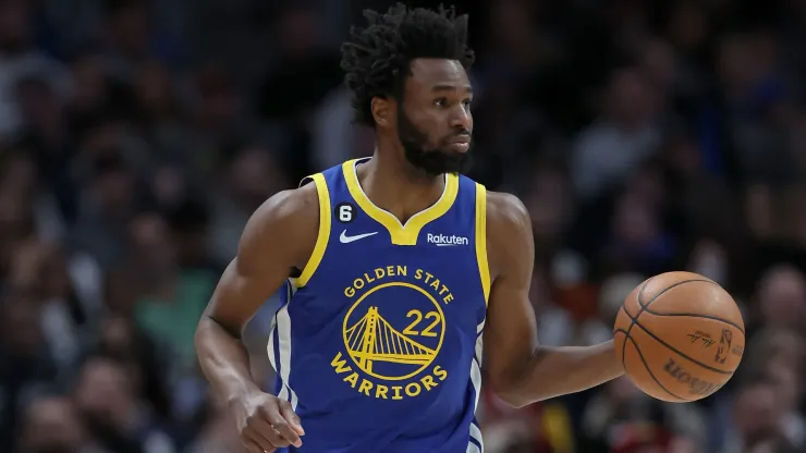 Andrew Wiggins dribbling a basketball.
