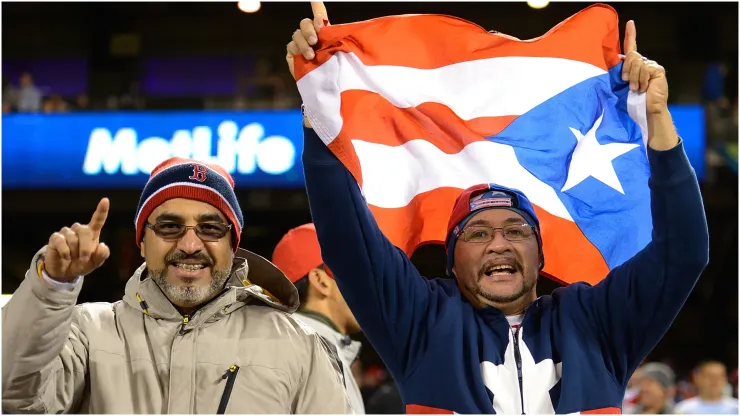 Fans of Team Puerto Rico waves the Puerto Rican Flag
