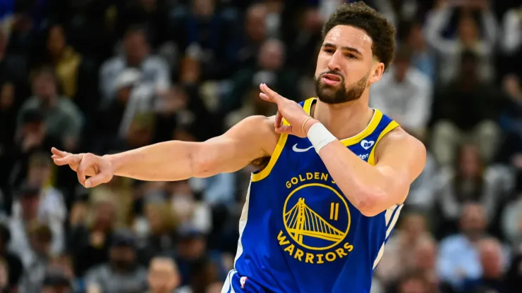 Klay Thompson celebrates after a shot.
