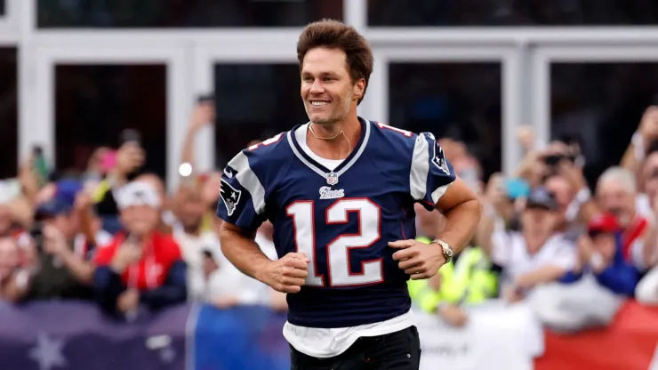 Tom Brady running at Gillette Stadium.
