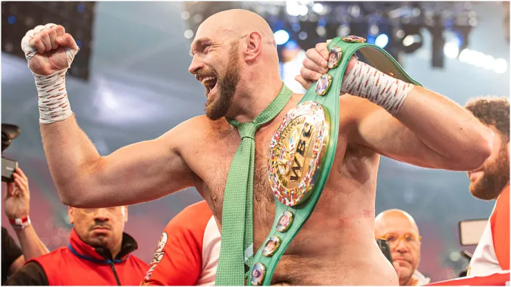 Tyson Fury celebrates in the ring
