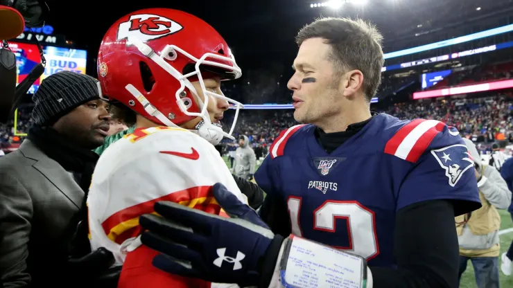 Tom Brady #12 of the New England Patriots talks with Patrick Mahomes #15 of the Kansas City Chiefs after the Chief defeat the Patriots 23-16 at Gillette Stadium on December 08, 2019 in Foxborough, Massachusetts.
