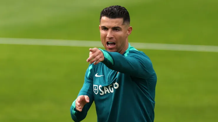 Cristiano Ronaldo of Portugal gestures during the Portugal Public Training Session at Heidewaldstadion on June 14, 2024 in Guetersloh, Germany.
