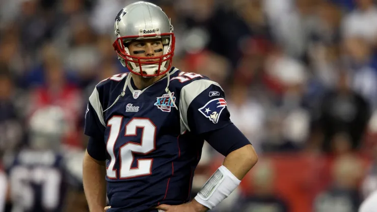 Quarterback Tom Brady #12 of the New England Patriots looks on during Super Bowl XLII against the New York Giants
