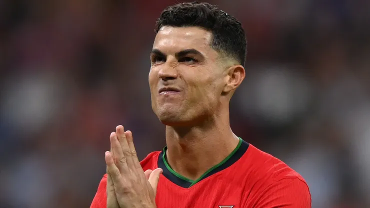 Cristiano Ronaldo of Portugal gestures to the crowd after scoring in the penalty shoot out during the UEFA EURO 2024 round of 16 match between Portugal and Slovenia.
