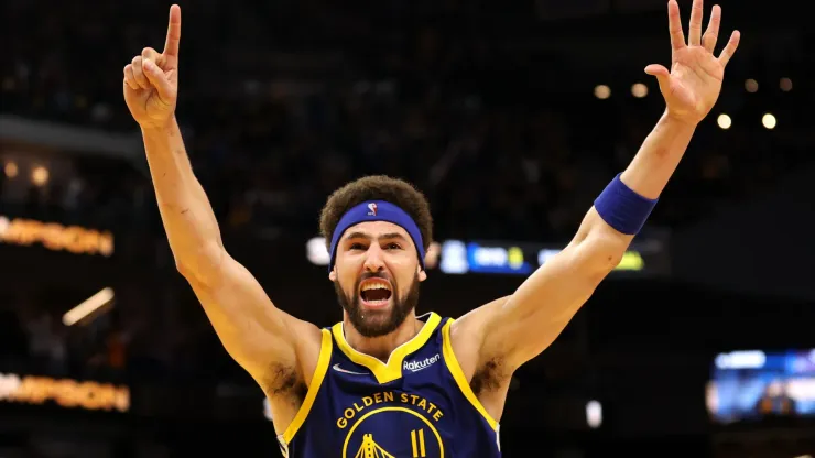 Klay Thompson #11 of the Golden State Warriors celebrates his three-point shot against the Memphis Grizzlies in the fourth quarter in Game Six of the 2022 NBA Playoffs Western Conference Semifinals.
