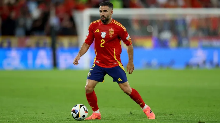 Daniel Carvajal of Spain runs with the ball during the UEFA EURO 2024 round of 16 match between Spain and Georgia.
