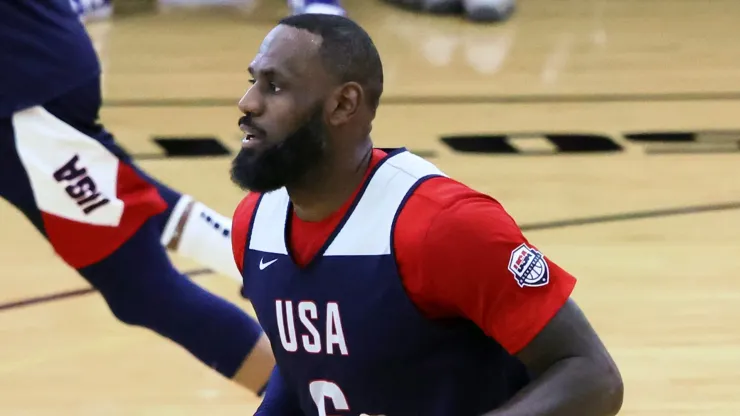 LeBron James #6 of the 2024 USA Basketball Men's National Team brings the ball up the court against the 2024 USA Basketball Men's Select Team during a practice session scrimmage at the team's training camp.
