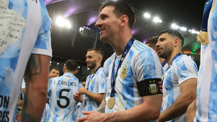 Lionel Messi of Argentina smiles with teammates after receiving the medal after winning the final of Copa America Brazil 2021 between Brazil and Argentina at Maracana Stadium on July 10, 2021 in Rio de Janeiro, Brazil. 
