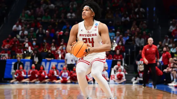 Ron Harper Jr. #24 of the Rutgers Scarlet Knights shoots the ball for three points in the first half of the game against the Notre Dame Fighting Irish during the First Four game of the 2022 NCAA Men's Basketball Tournament at UD Arena on March 16, 2022 in Dayton, Ohio. 
