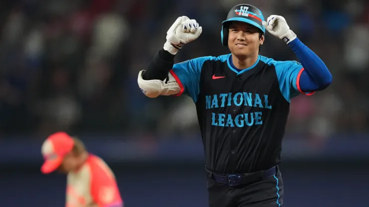 Shohei Ohtani #17 of the Los Angeles Dodgers celebrates after hitting a three-run home run in the third inning against the American League during the 94th MLB All-Star Game presented by Mastercard at Globe Life Field on July 16, 2024 in Arlington, Texas.
