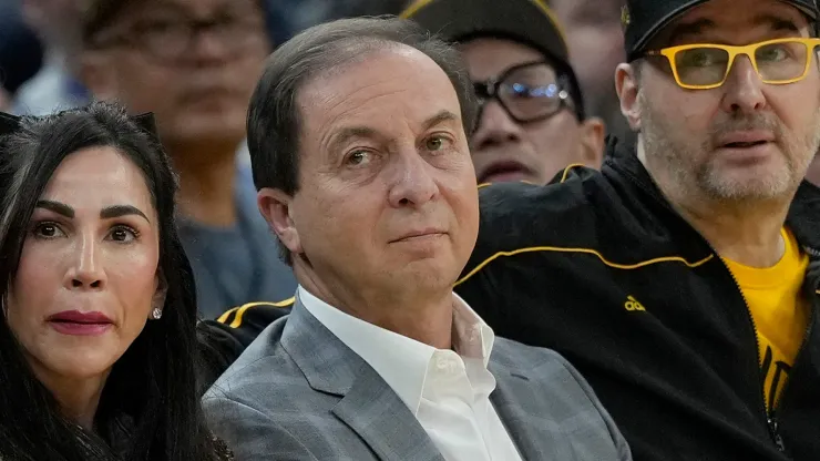 Nicole Curran, Golden State Warriors owner Joe Lacob, and poker pro Phil Hellmuth sit court side during the second quarter of the game between the San Antonio Spurs and Golden State Warriors at Chase Center on March 09, 2024 in San Francisco, California.
