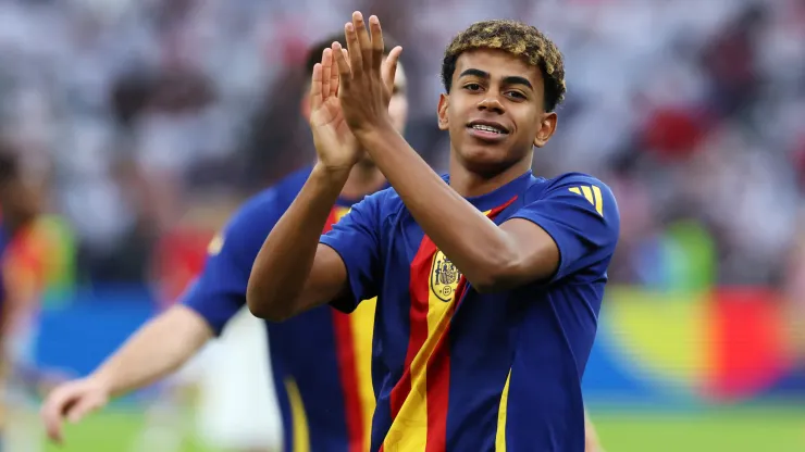 Lamine Yamal of Spain applauds the fans as he warms up prior to the UEFA EURO 2024 final match between Spain and England
