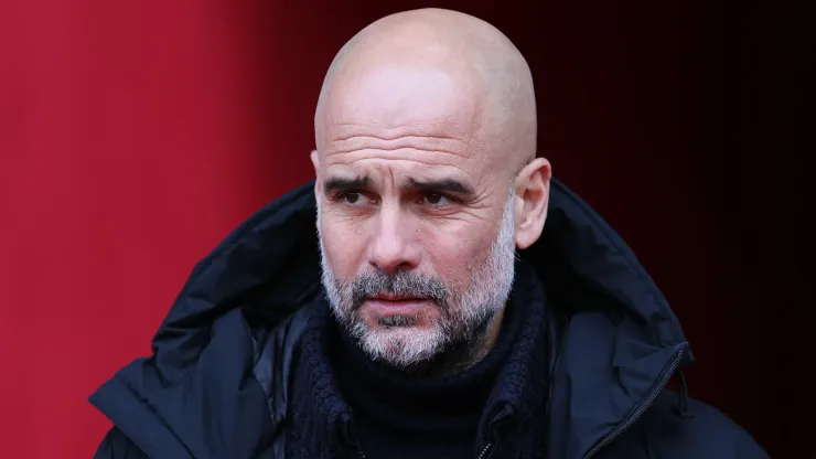 Pep Guardiola, Manager of Manchester City, looks on prior to the Premier League match between Nottingham Forest and Manchester City
