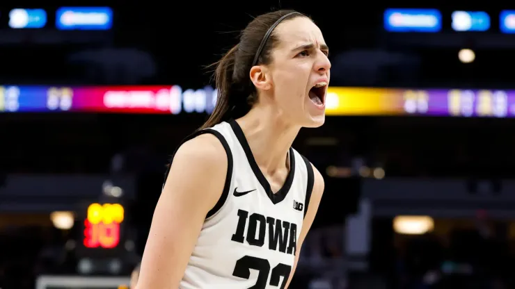 Caitlin Clark #22 of the Iowa Hawkeyes celebrates her three-point basket against the Ohio State Buckeyes in the first half of the championship game of the Big Ten Women's Basketball Tournament at Target Center on March 5, 2023 in Minneapolis, Minnesota.
