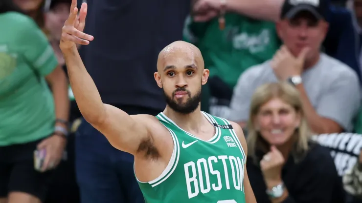 Derrick White #9 of the Boston Celtics reacts after a three point basket against the Dallas Mavericks during the first quarter of Game Five of the 2024 NBA Finals
