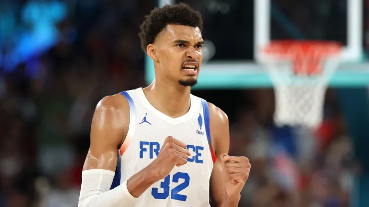 Victor Wembanyama #32 of Team France reacts during a Men's basketball quarterfinal game between Team Canada and Team France on day eleven of the Olympic Games Paris 2024 at Bercy Arena on August 06, 2024 in Paris, France.
