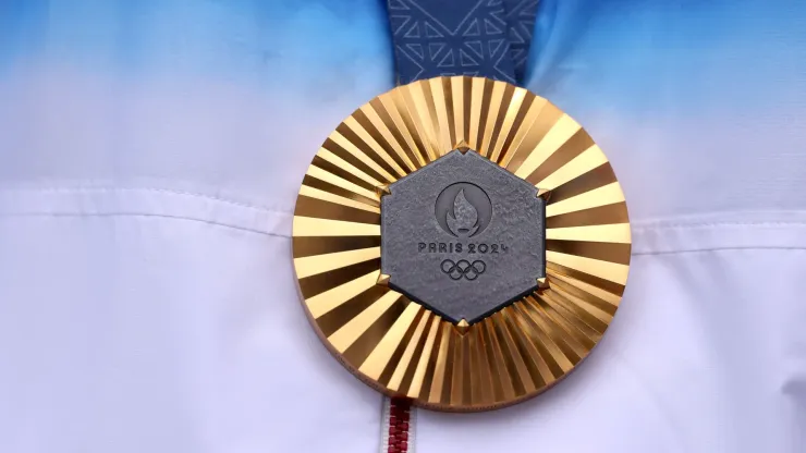 A detailed view of the gold medal of Sihyeon Lim of Team Republic of Korea, (obscured) on the podium after the Women’s Individual Archery competition on day eight of the Olympic Games Paris 2024 at Esplanade Des Invalides on August 03, 2024 in Paris, France.
