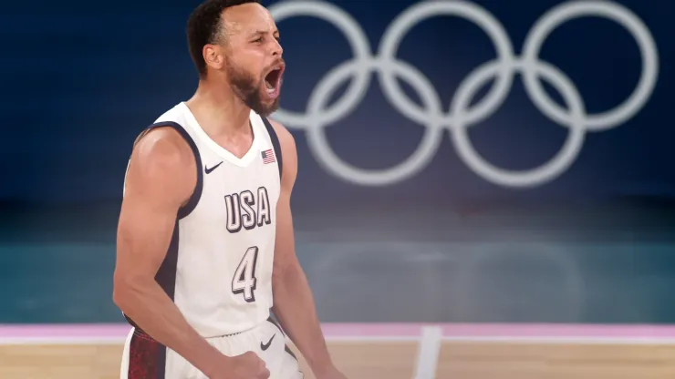 Stephen Curry #4 of Team United States reacts after a basket during a Men's basketball semifinals match between Team United States and Team Serbia on day thirteen of the Olympic Games Paris 2024 at Bercy Arena on August 08, 2024 in Paris, France.
