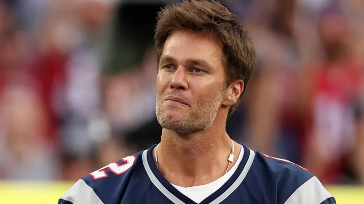 Former New England Patriots quarterback Tom Brady speaks during a ceremony honoring him at halftime of New England's game against the Philadelphia Eagles at Gillette Stadium on September 10, 2023 in Foxborough, Massachusetts.
