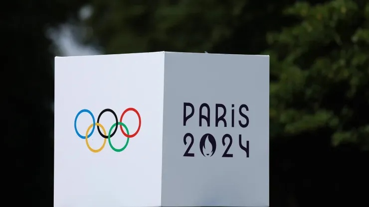  A detailed view of the Paris 2024 Olympics logo on a podium during an Equestrian Eventing training session
