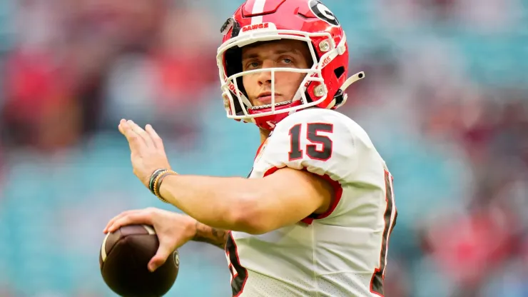 Carson Beck #15 of the Georgia Bulldogs warms up before the Capital One Orange Bowl against the Florida State Seminoles at Hard Rock Stadium on December 30, 2023 in Miami Gardens, Florida.
