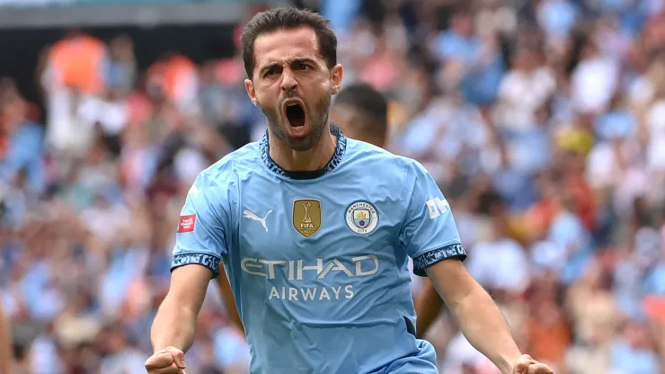 Bernardo Silva of Manchester City celebrates scoring his team's first goal during the 2024 FA Community Shield
