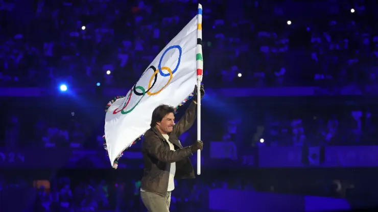 American Actor and Film Producer Tom Cruise carries the IOC Flag during the Closing Ceremony of the Olympic Games Paris 2024
