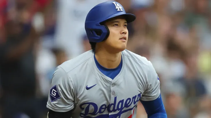 Shohei Ohtani #17 of the Los Angeles Dodgers hits a home run during the third inning against the Milwaukee Brewers at American Family Field on August 13, 2024 in Milwaukee, Wisconsin.
