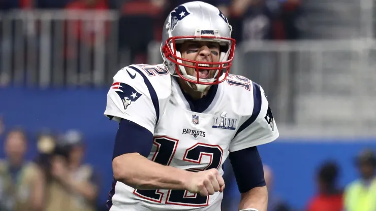 Tom Brady #12 of the New England Patriots celebrates his teams fourth quarter touchdown against the Los Angeles Rams during Super Bowl LIII at Mercedes-Benz Stadium on February 03, 2019 in Atlanta, Georgia.
